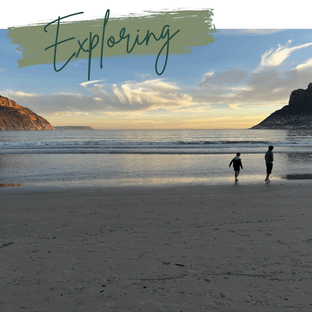 two kids walking a beach